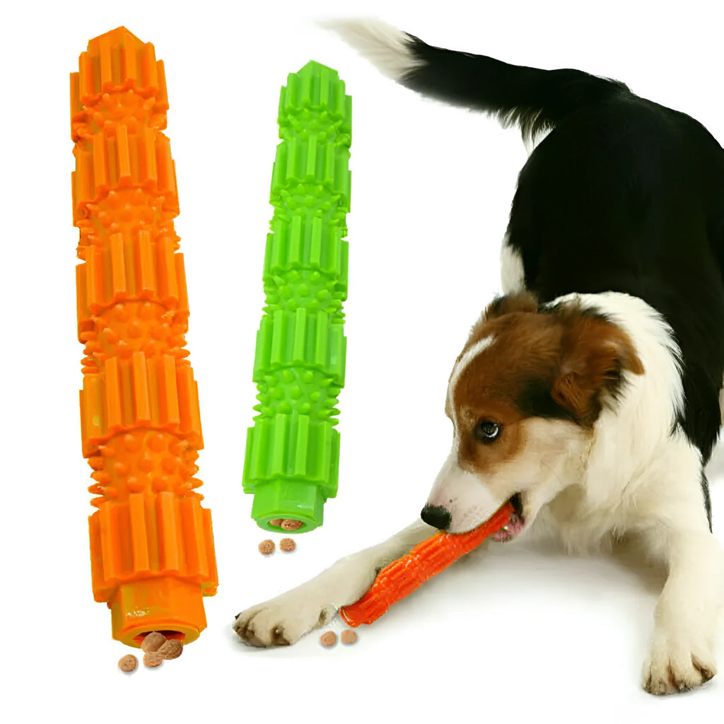 Green and orange rubber dog chew toy with treat dispensing opening and textured cleaning surfaces