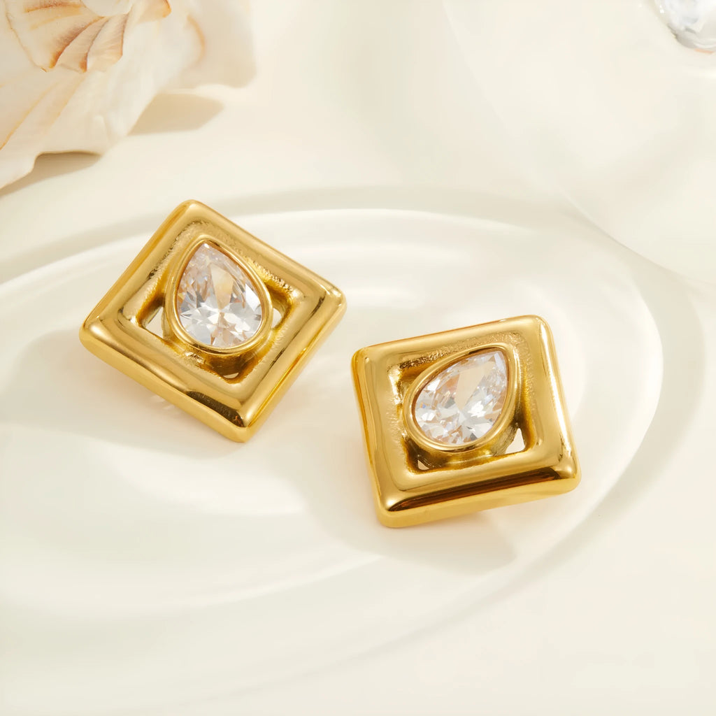 Gold-tone geometric stud earrings with inlaid water drop zircon stones on stainless steel