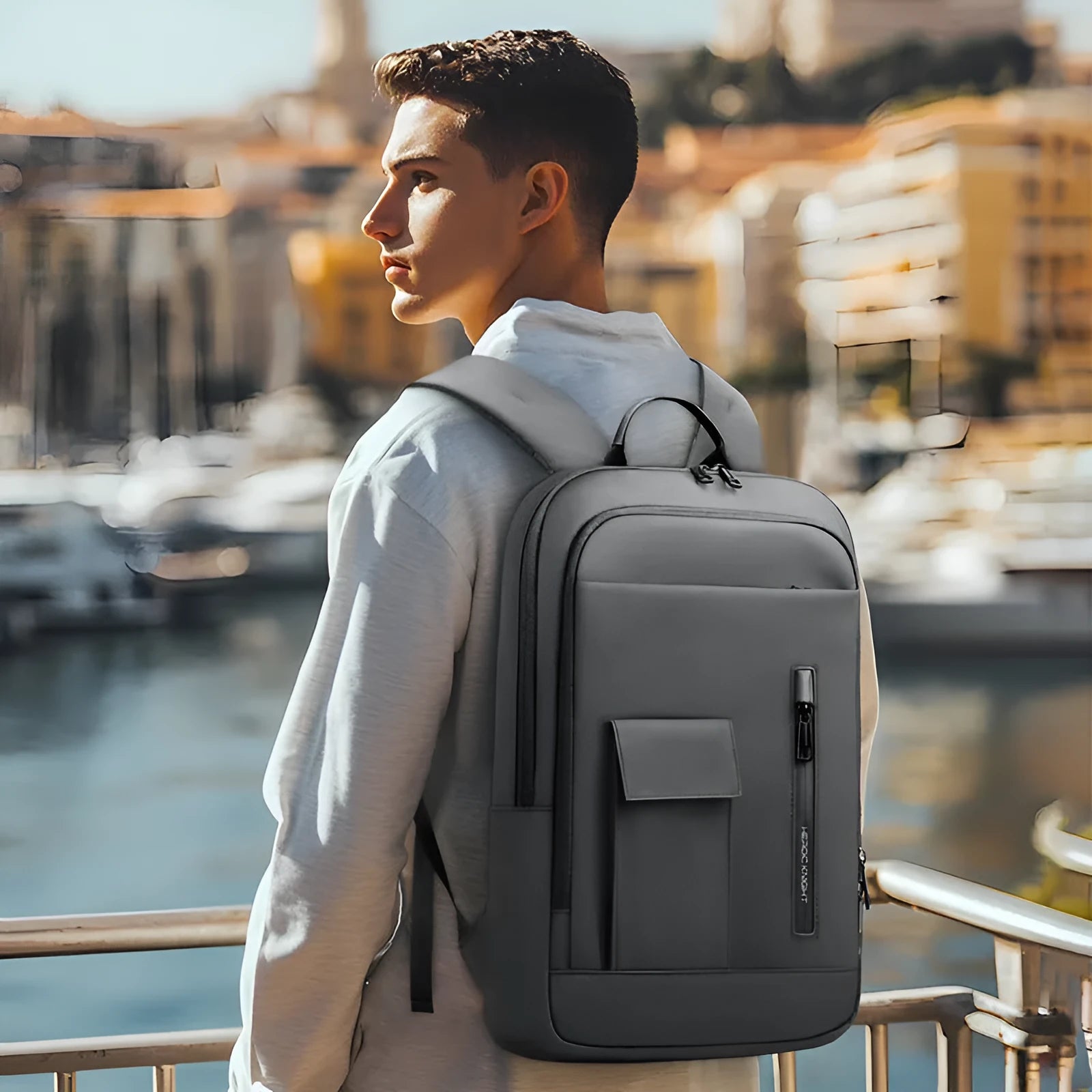 Men's lightweight Oxford cloth backpack in dark grey with crossbody design for business and travel