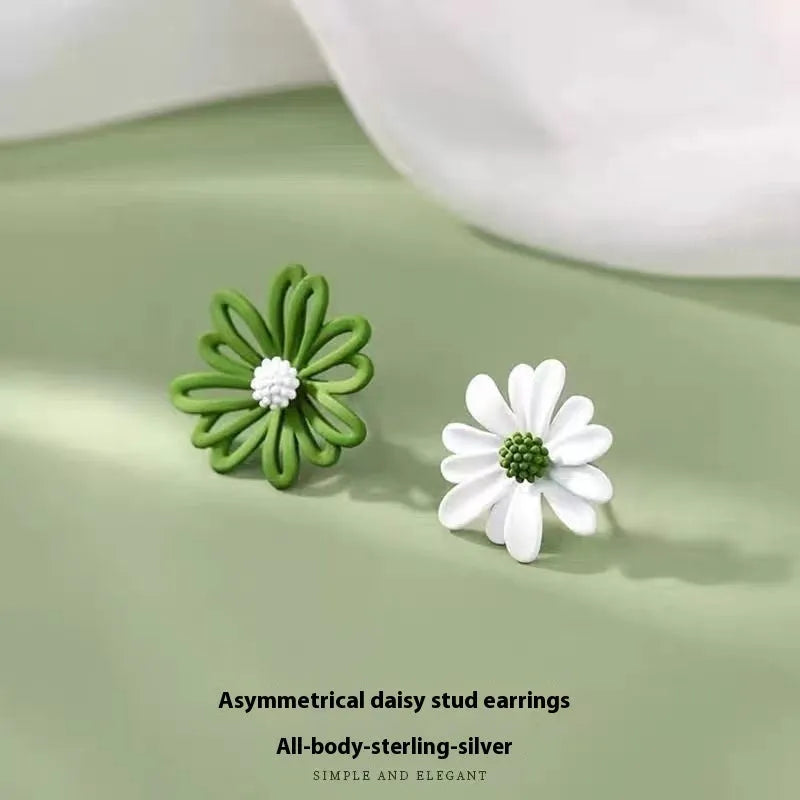 Cartoon flower stud earrings in blue and orange, white and green, or yellow and white alloy construction