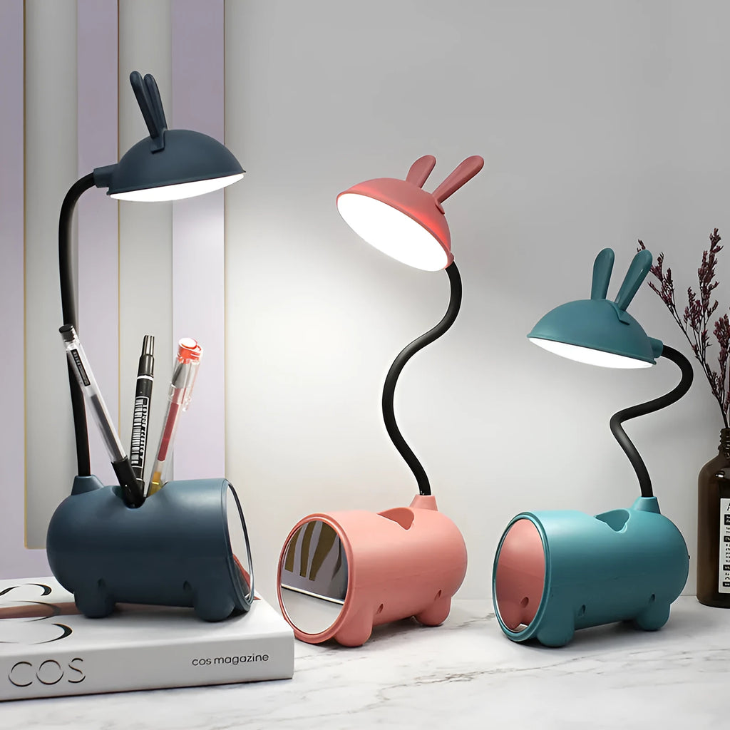 Green cartoon USB desktop lamp with pen storage container on wooden desk