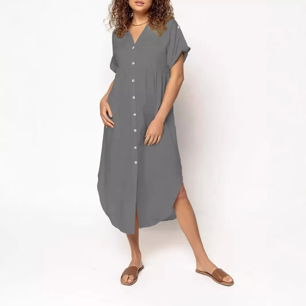 Loose fit solid colour mid-length casual dress with button front detail on a hanger