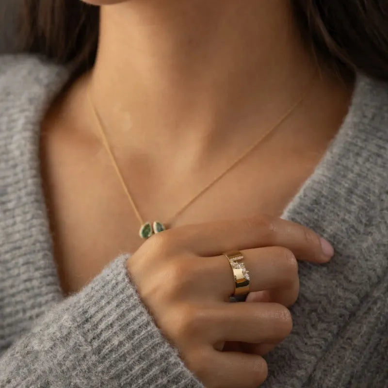 Gold-coloured women's ring with zircon accents on copper base, showing electroplated finish and personality style design.