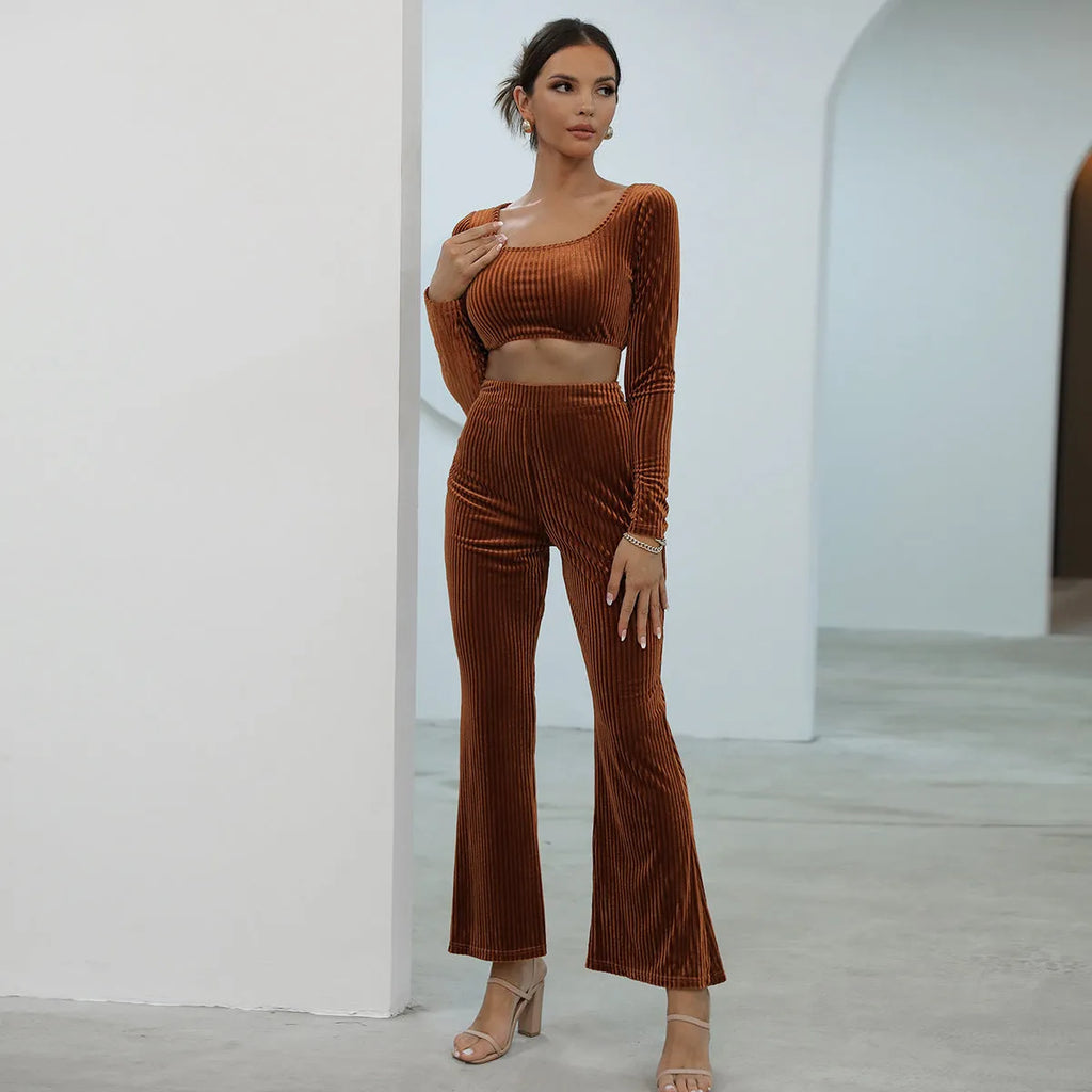 Caramel-coloured long sleeve sweater set with matching top and trousers on hanger
