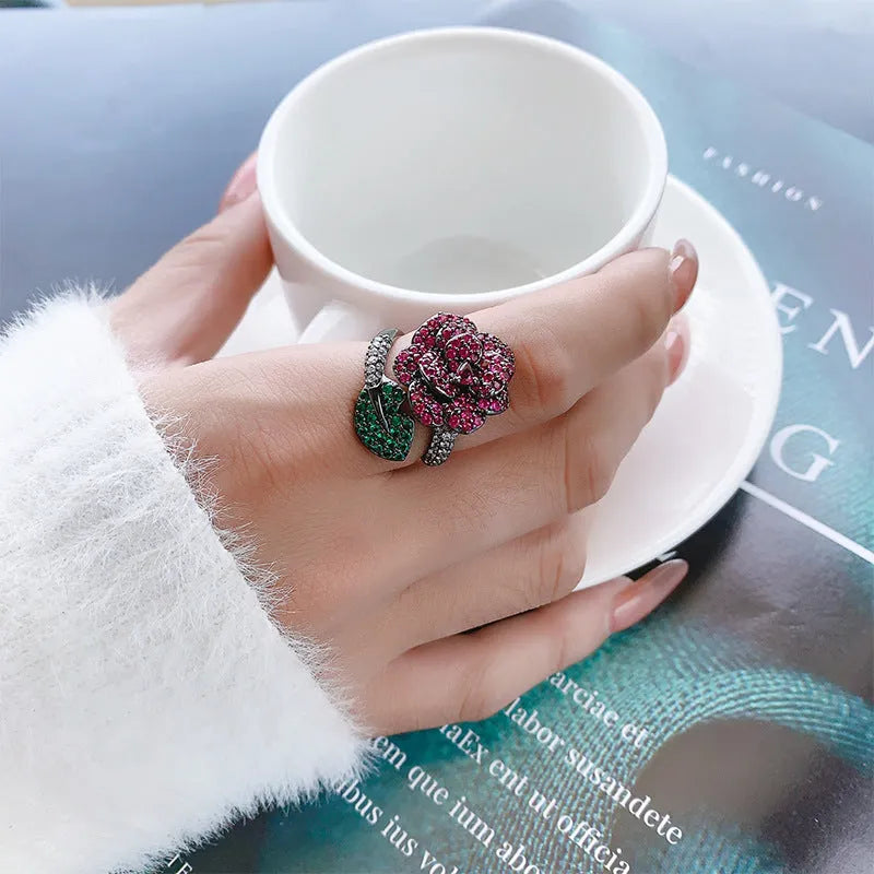 Black gold geometric ring with red corundum stones, female fashion jewellery