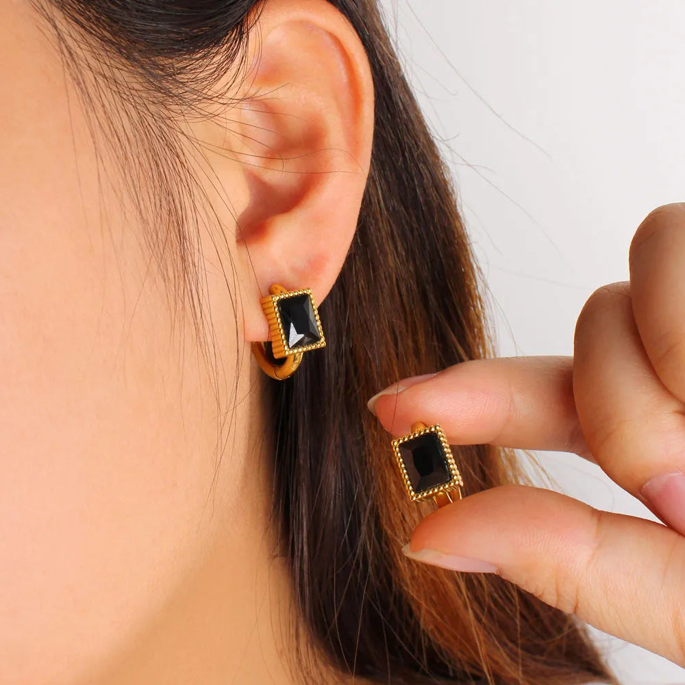Women's stainless steel earrings with geometric square zircon design in white, black, and green colour options
