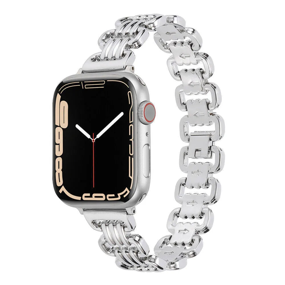 Silver alloy metal bracelet for an Apple watch on a wrist, showing the connector and band detail.