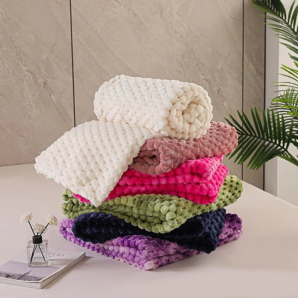 Polyester plaid children's nap blanket in solid colour with velvet finish, shown in multiple size options