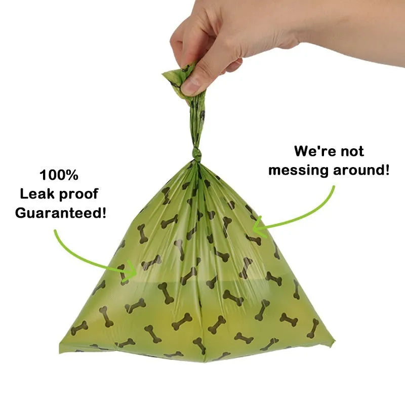 Military green degradable dog poop bags with black bone print pattern, showing roll configuration