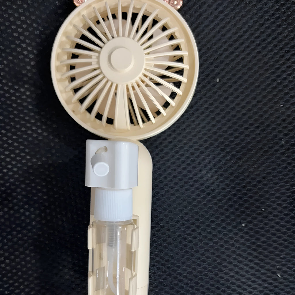 A personalised plastic desk fan with USB charging port, shown in one of five colour options.