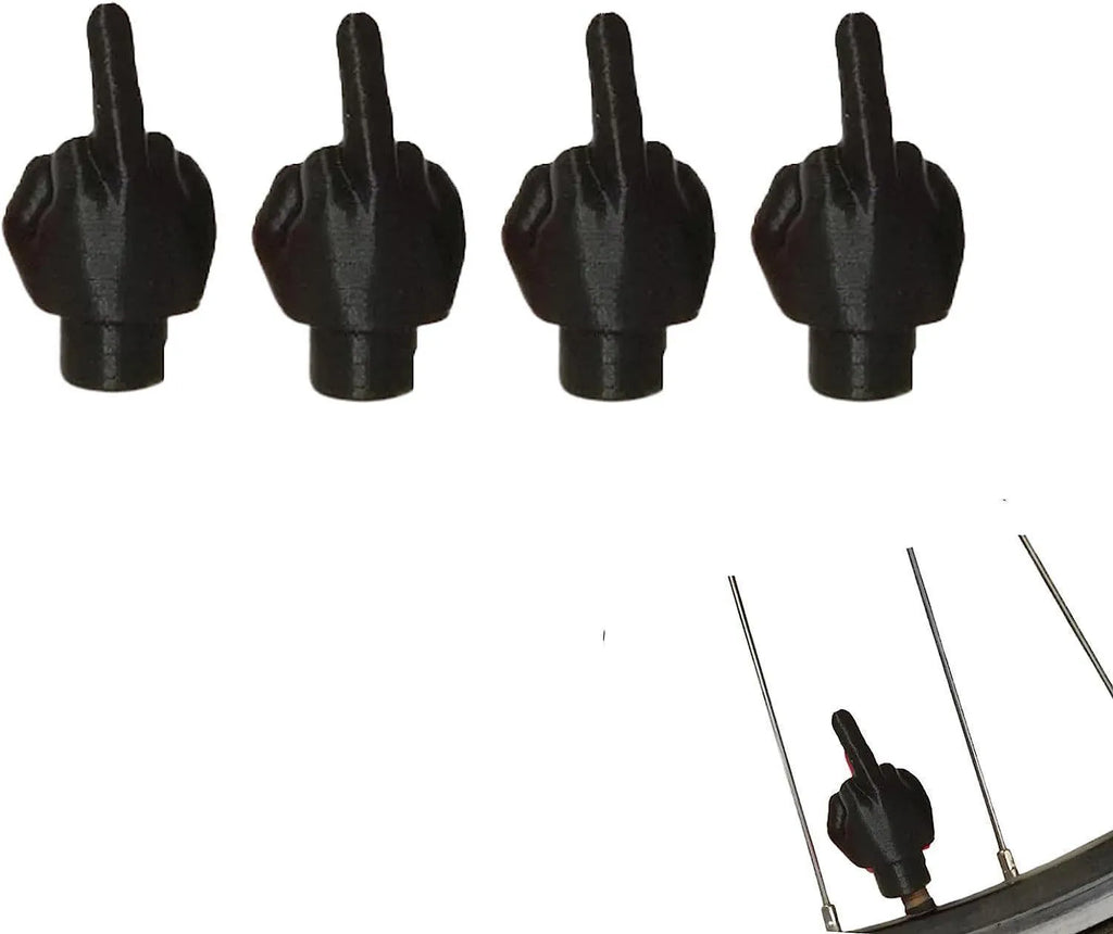 Eight latex car tyre valve caps, four black and four skin colour, for dust protection.