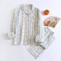 Women's cotton gauze loungewear set with long-sleeved top and trousers in a colour stripes print.