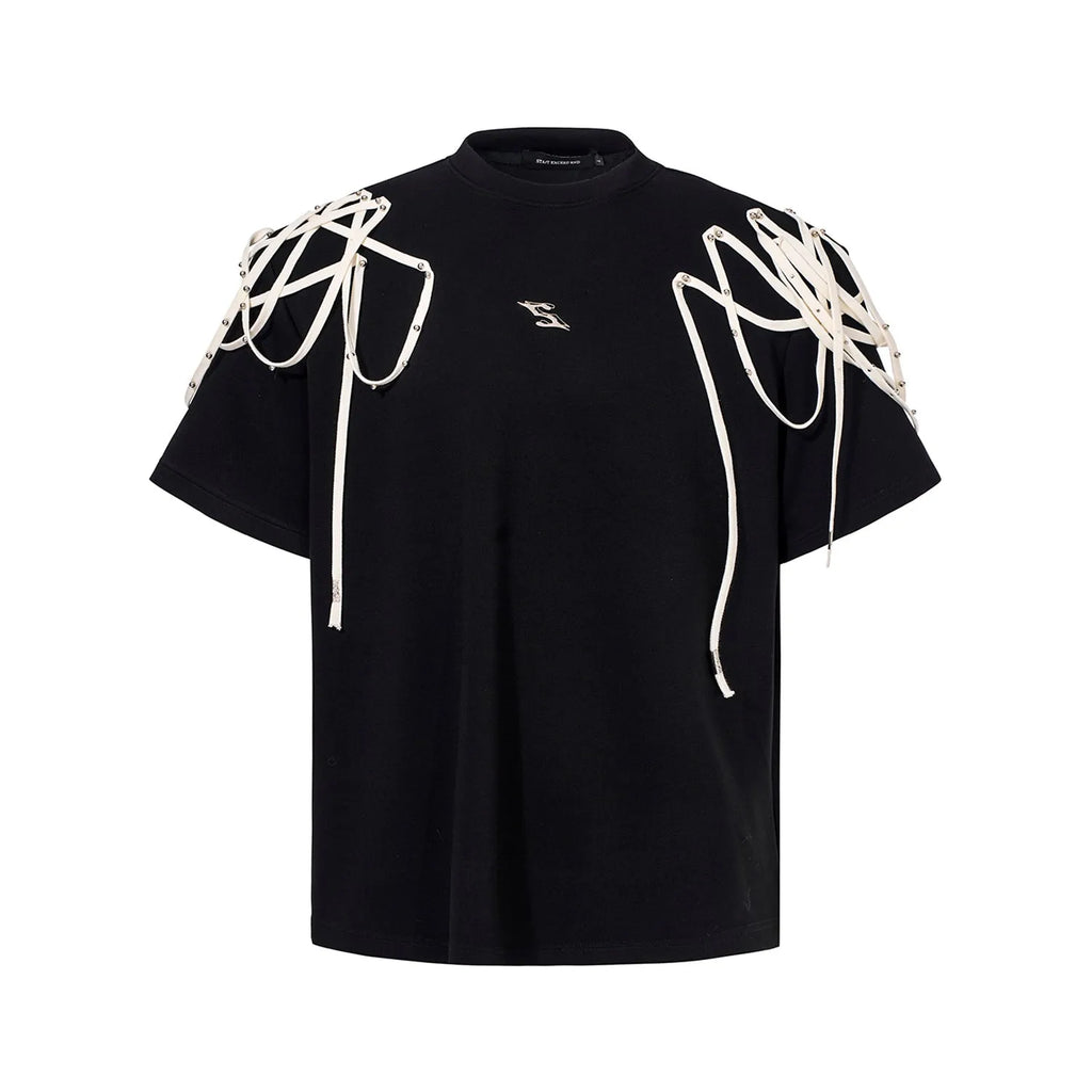 Black loose fit T-shirt with padded shoulders featuring decorative rivet detailing and ribbed texture