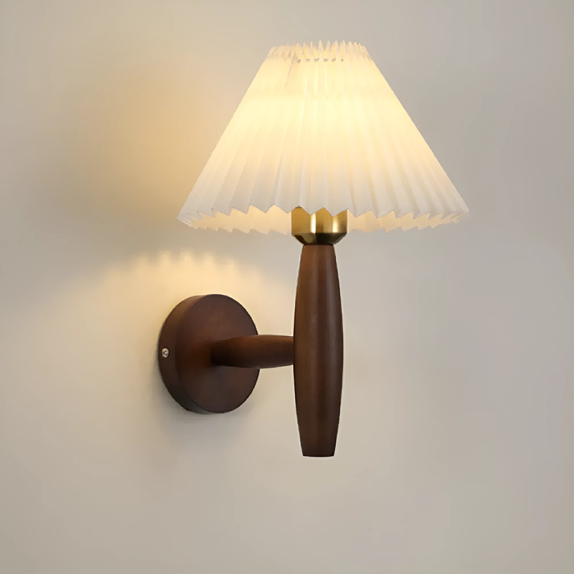 American retro rubber wood and fabric wall lamp in walnut finish on a wall.