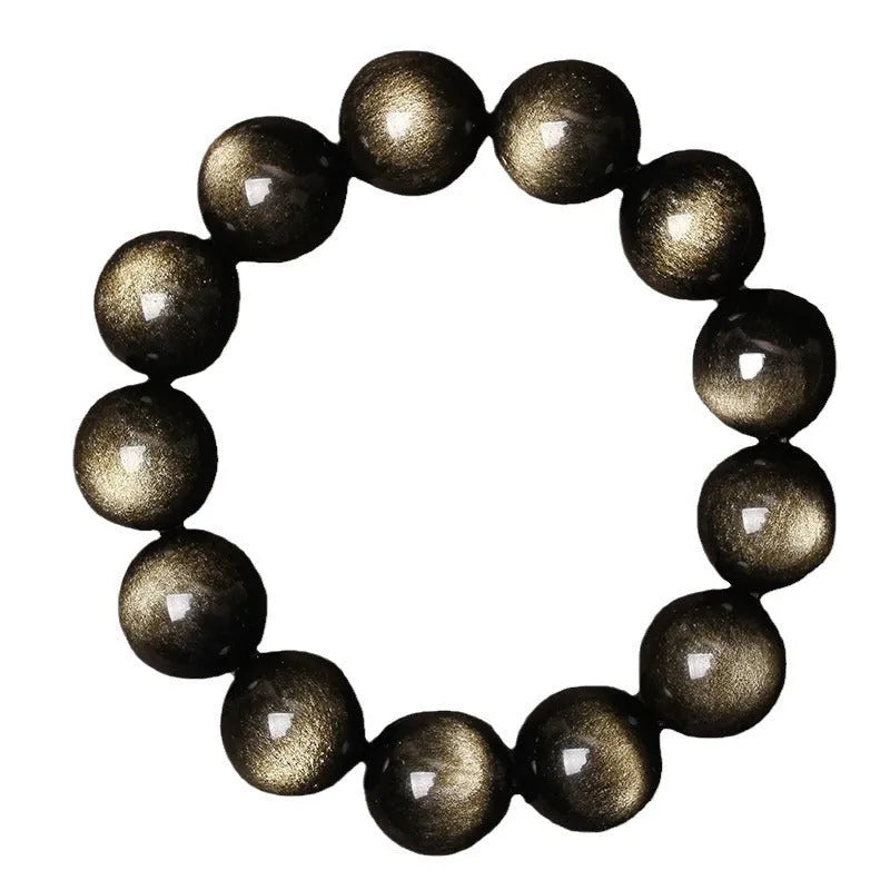 Hand-woven black obsidian bracelet with round beads, shown as a couple's set on a wrist.