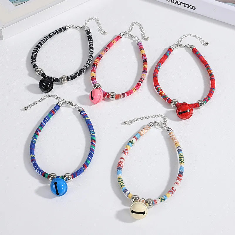 Adjustable ethnic pattern pet collar with metal bell for a cat or small dog