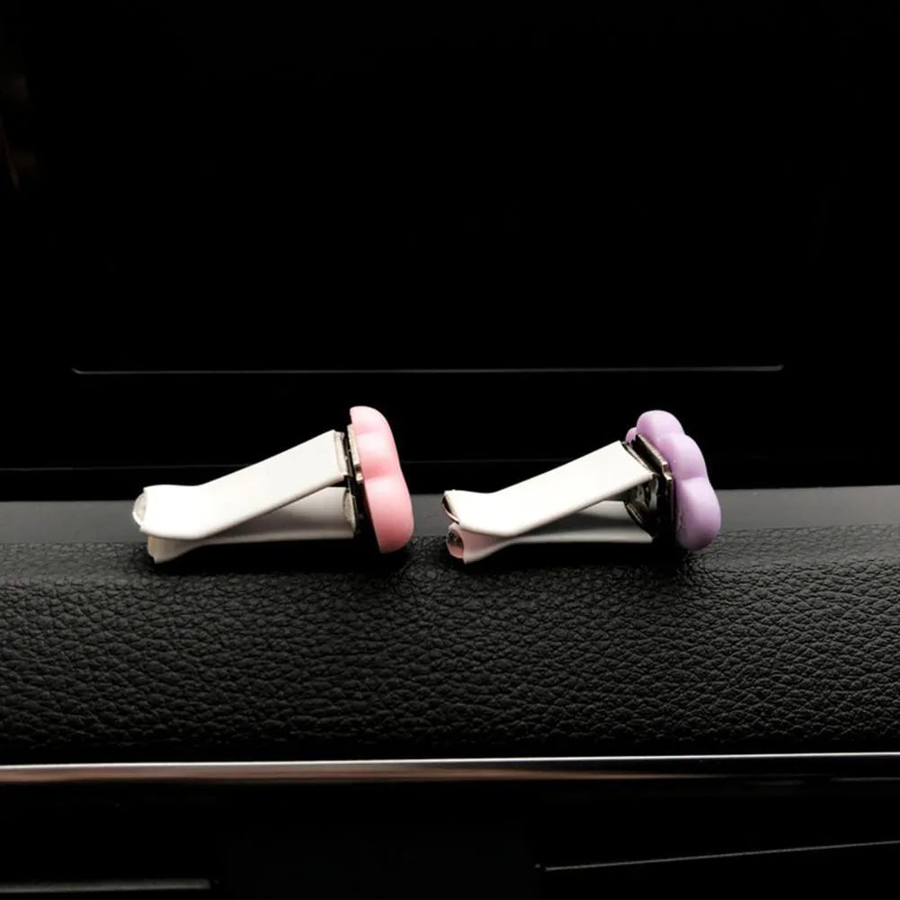 Baiyun cartoon resin car fragrance clip for air vents in assorted pastel colours.