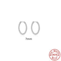 Sterling silver twisted round earrings in gold or white gold finish showing geometric design and S925 marking