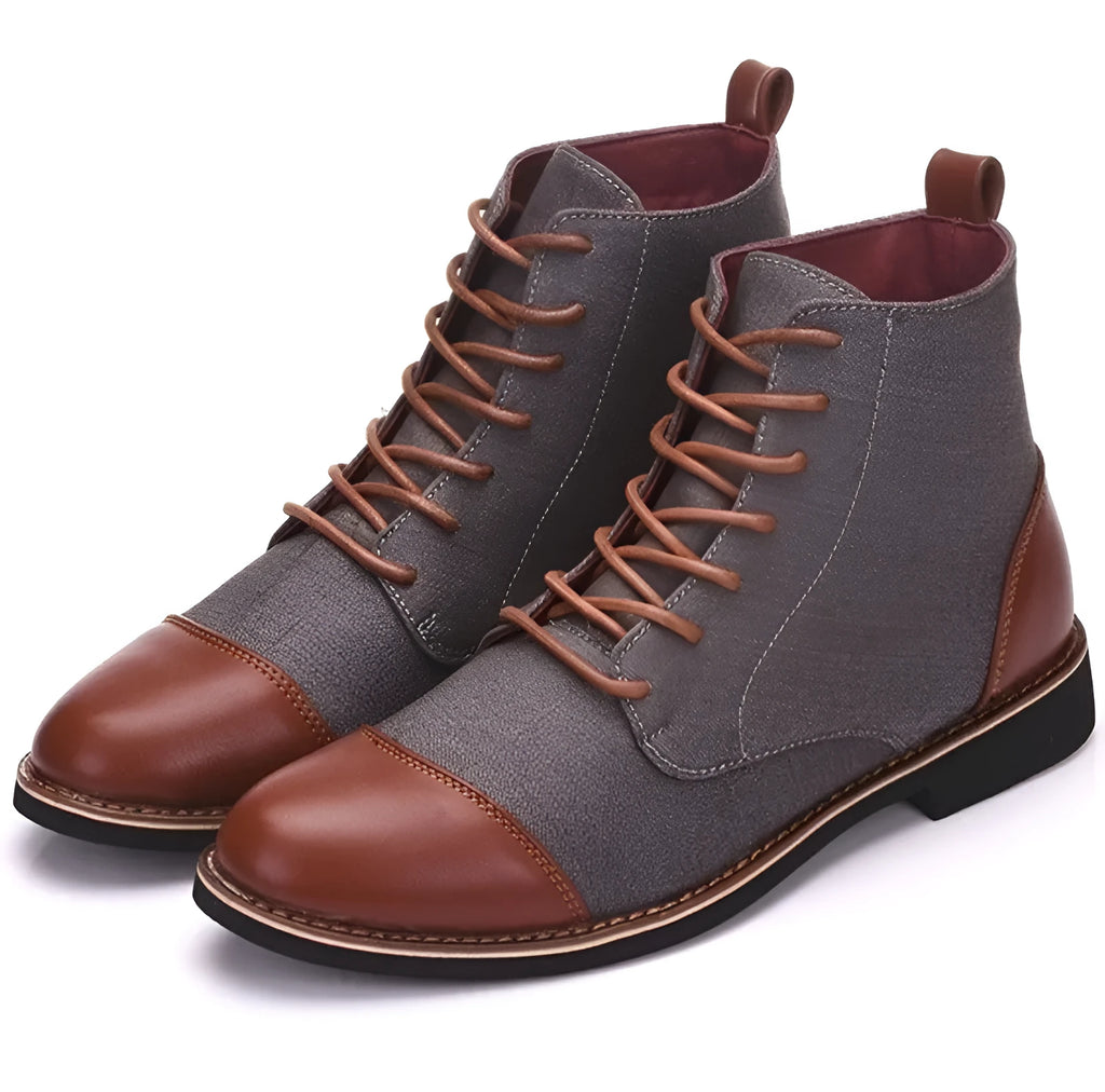 Large black leather motorcycle-style boots with metal belt buckle detailing on the shaft.