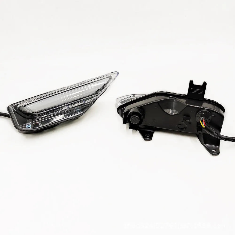 Infiniti Q50 Q70 front bumper LED daytime running light and fog lamp assembly in ABS housing