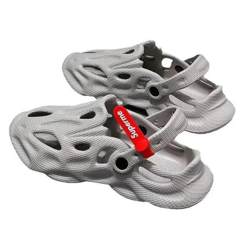 Solid colour EVA coconut slippers with closed toe, perforated upper, and thickened sole.