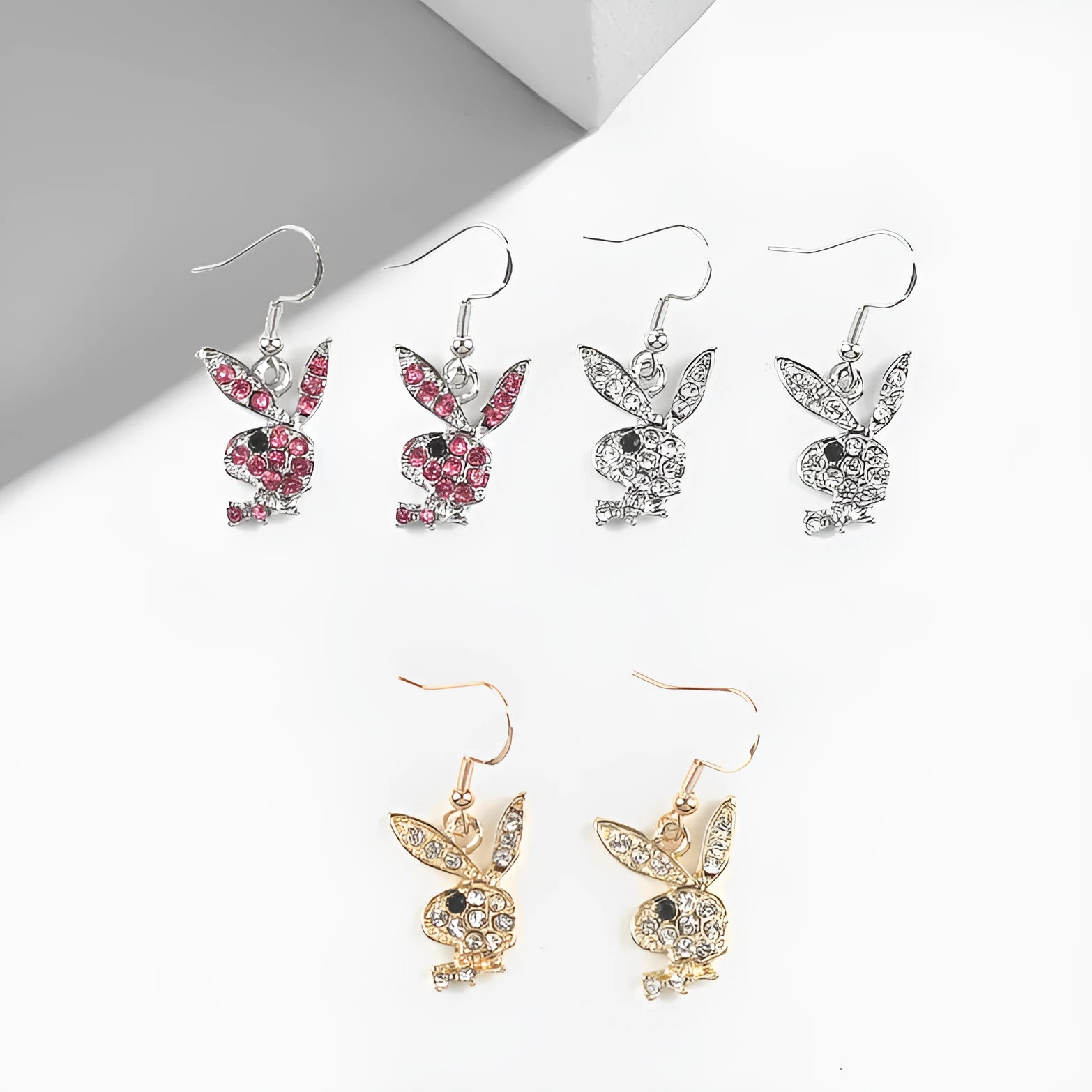 Rabbit stud earrings with diamond decoration in silver, pink, and gold alloy finishes