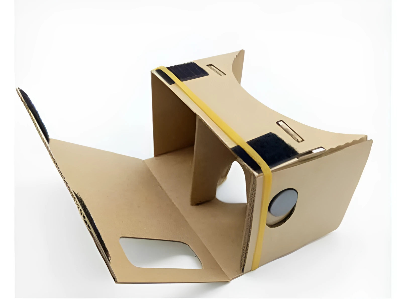 Foldable pink and white cardboard VR glasses headset with lenses and rubber head strap for smartphones.