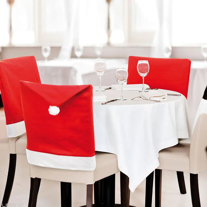 Set of red and white Christmas chair covers featuring Santa Claus, Snowman, and Santa Hat designs.