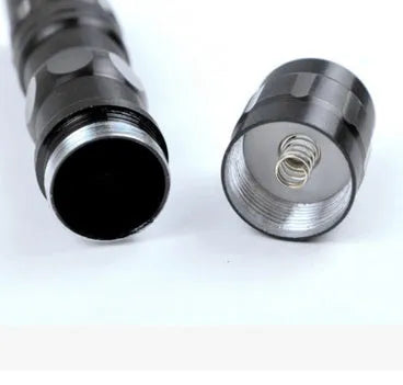 Black aluminium LED mini flashlight showing compact 9.5cm length with 3W bulb