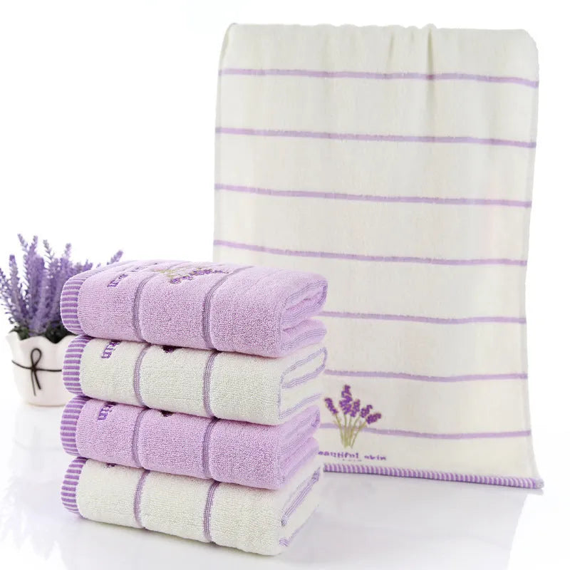 Pure cotton 32 strand embroidered face washing towel in green, 34x74 cm, on white background