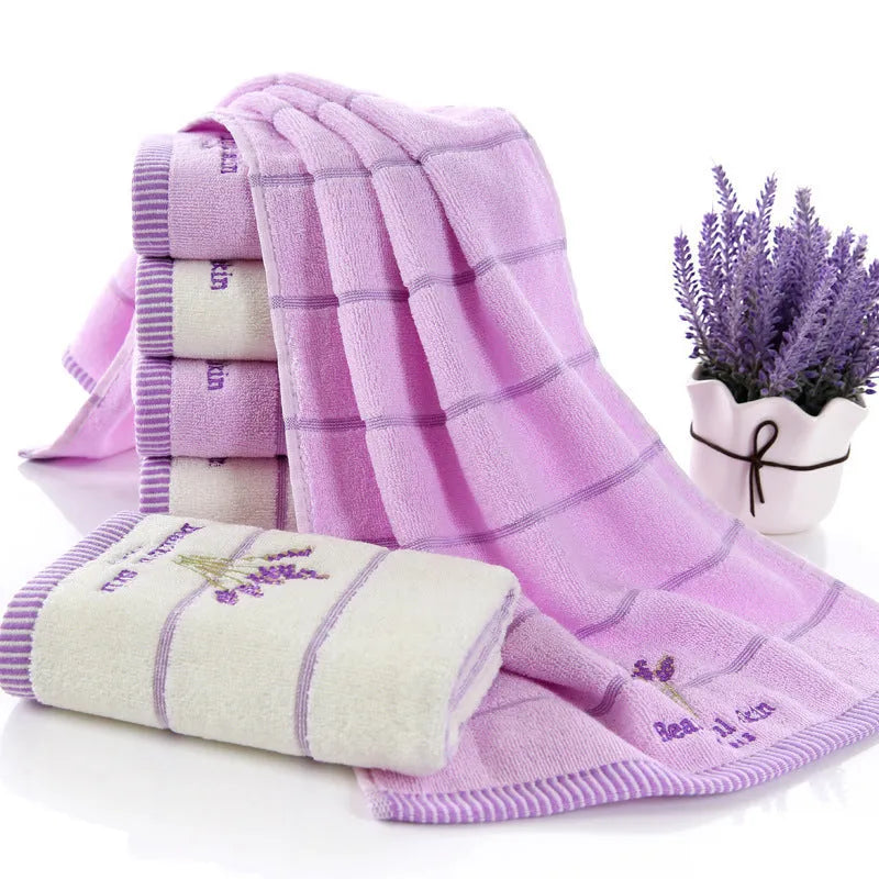 Pure cotton 32 strand embroidered face washing towel in green, 34x74 cm, on white background