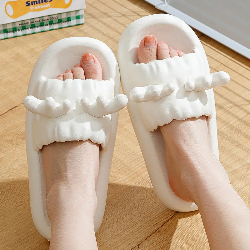 Women's EVA flip flop slippers with deer horn design in light yellow colour showing hollow out pattern