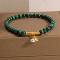 Women's adjustable white crystal bracelet with lucky bamboo charm in high-rise setting