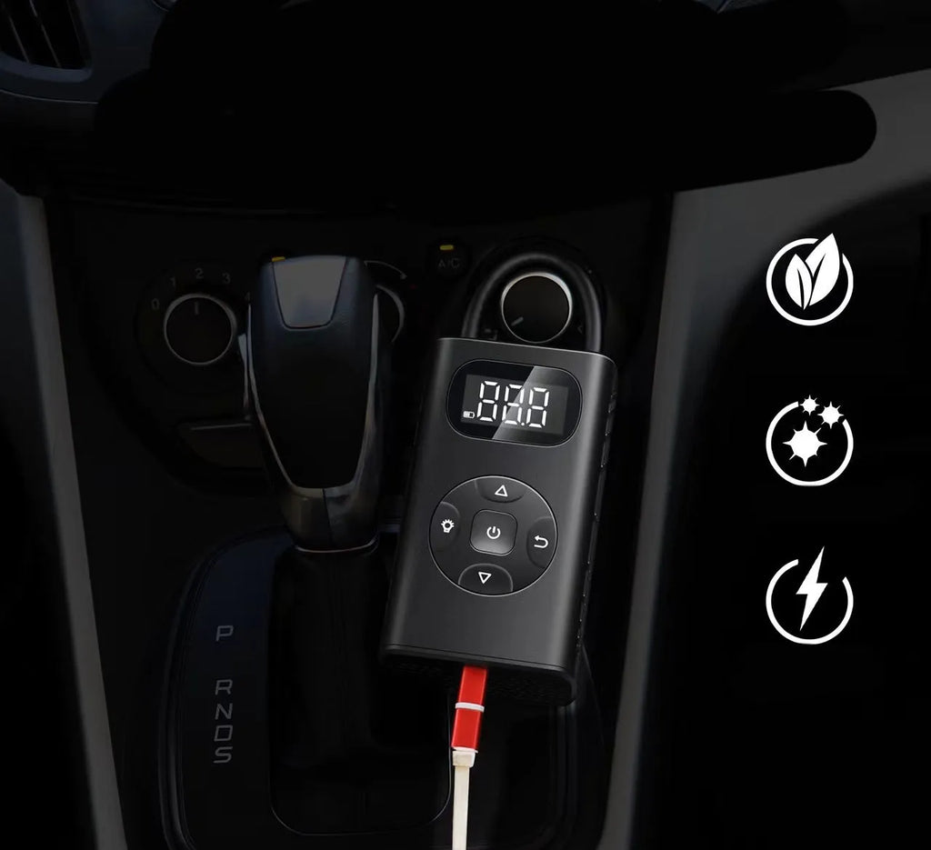 Black M09X portable power bank tyre inflator with digital display and 16cm air hose on a dark background.
