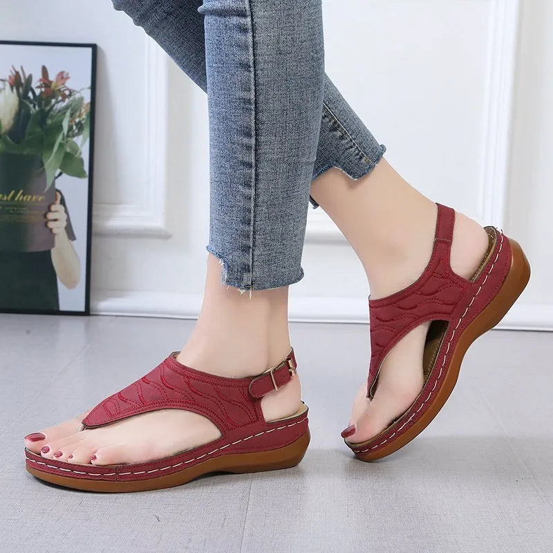 Women's wedge heel flip flop sandals with adjustable buckle strap in solid colours