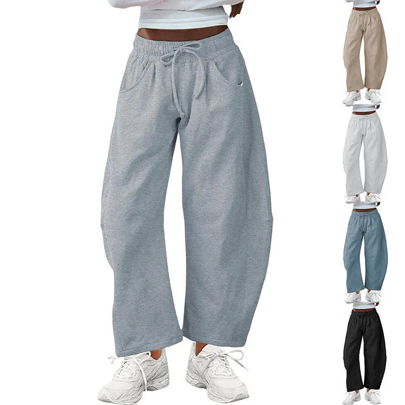 Women's loose fit cropped sweatpants with drawstring waist and side pockets in cotton blend fabric