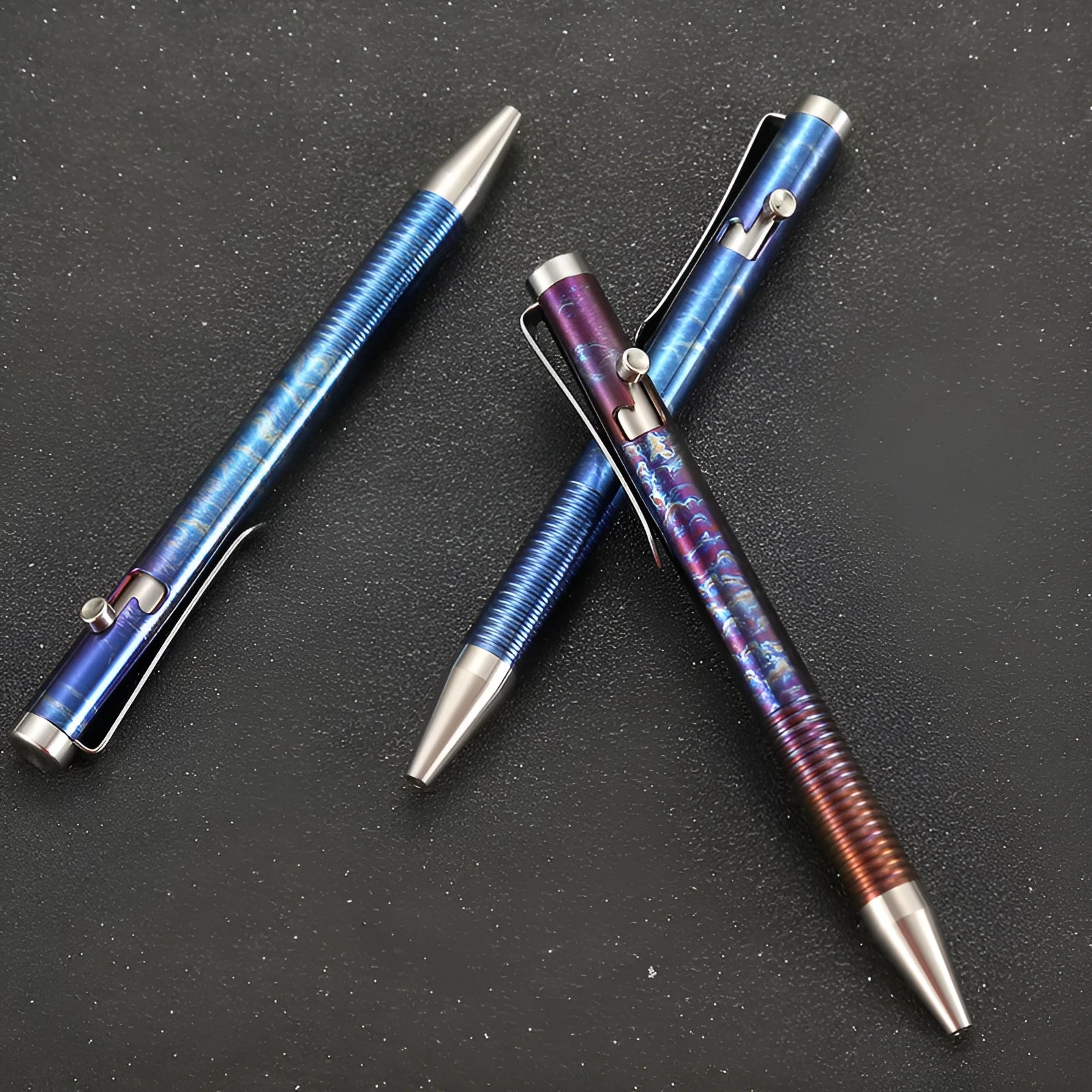 Titanium alloy bolt action ball pen with gun bolt handle and phantom colour finish.