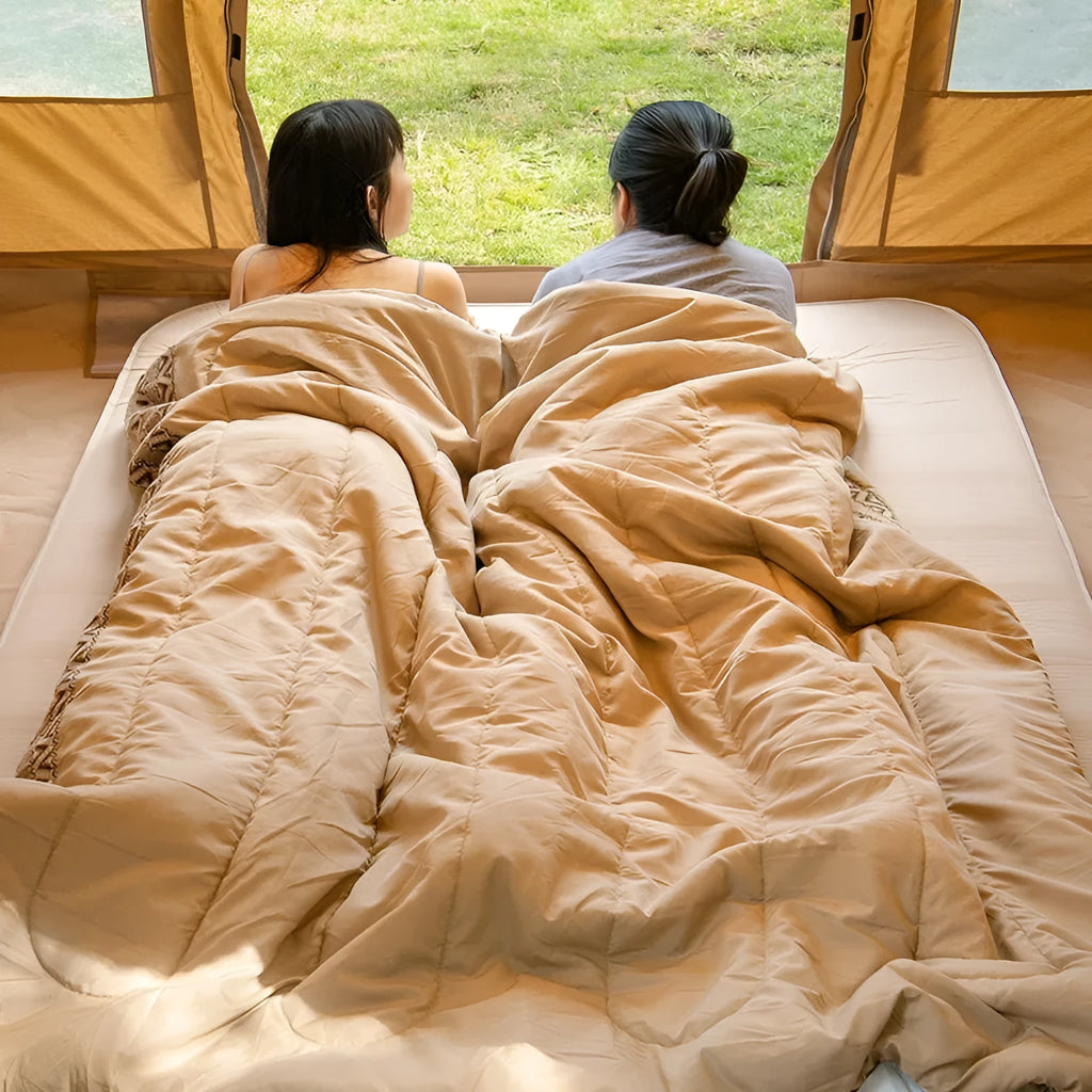 Four seasons portable camping sleeping bag for adults in Chunya fabric, shown in Swamp colour.