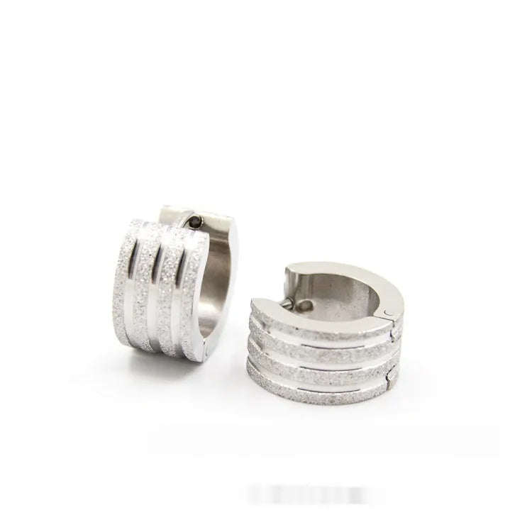 Geometric three-line frosted titanium steel earrings in Korean style on a white background.