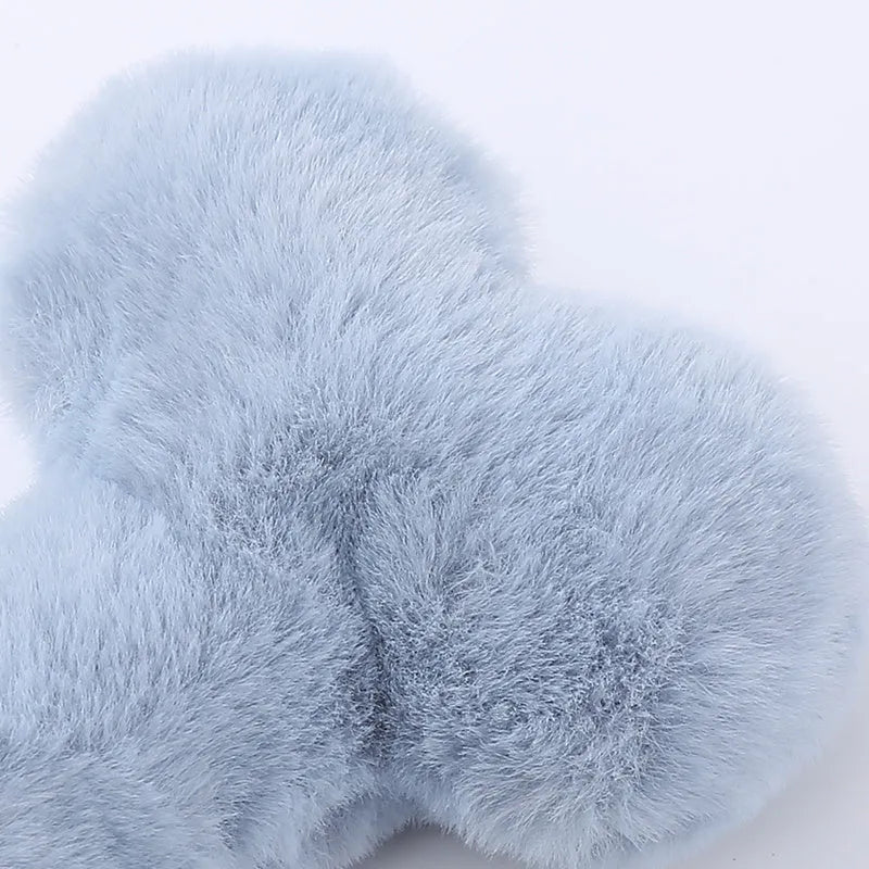 Blue love bone shaped plush dog toy with vocal BB rattle for interactive chewing play