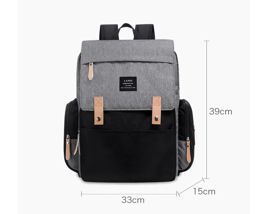 Land Mommy large grey oxford cloth diaper backpack with a changing mat