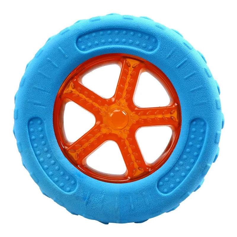 Set of three TPR floating squeaky dog toys: a red ball, blue barbell, and orange tyre with bumpy textures.