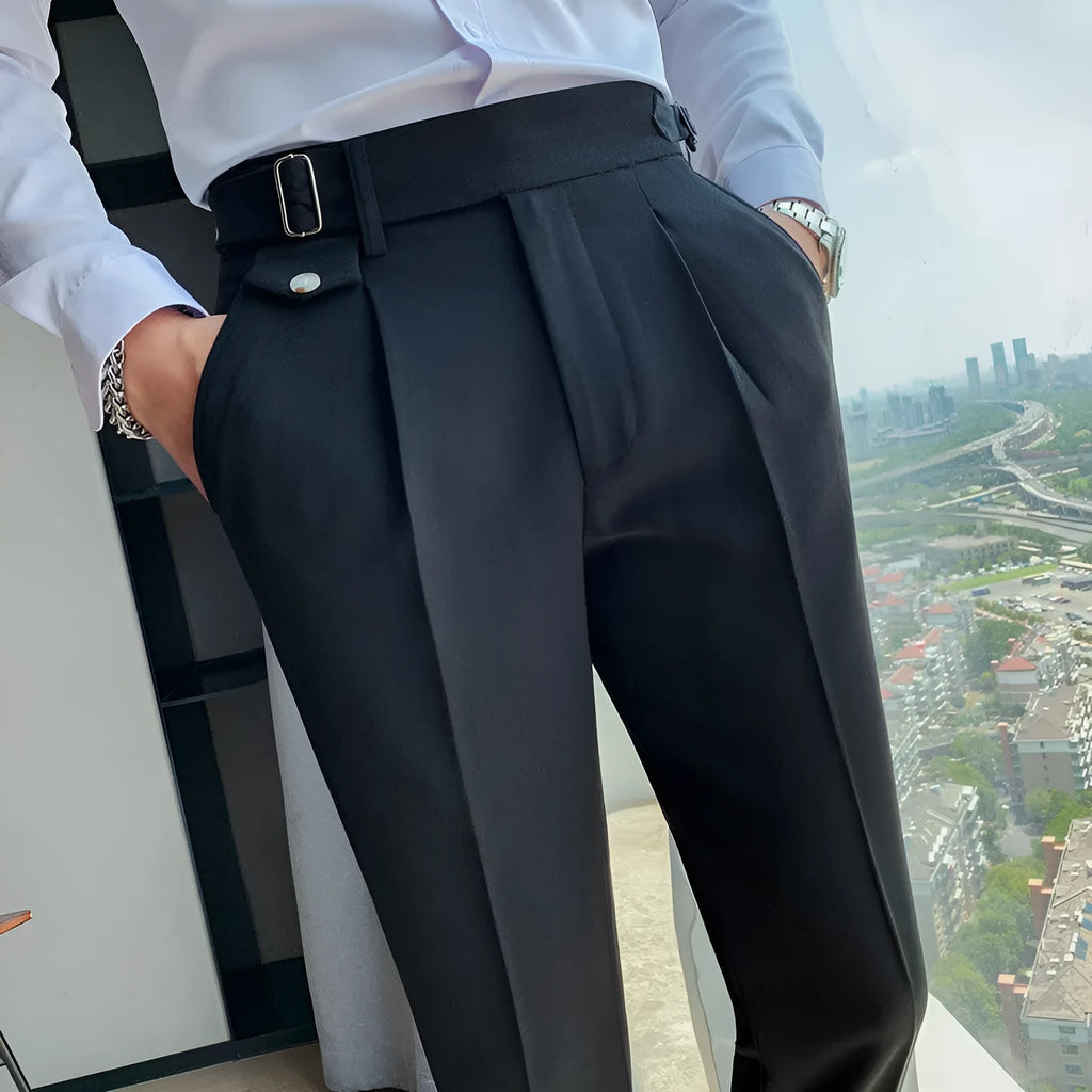 Straight-leg casual trousers in a neutral colour on a hanger, showing the simple fit and polyester fabric.