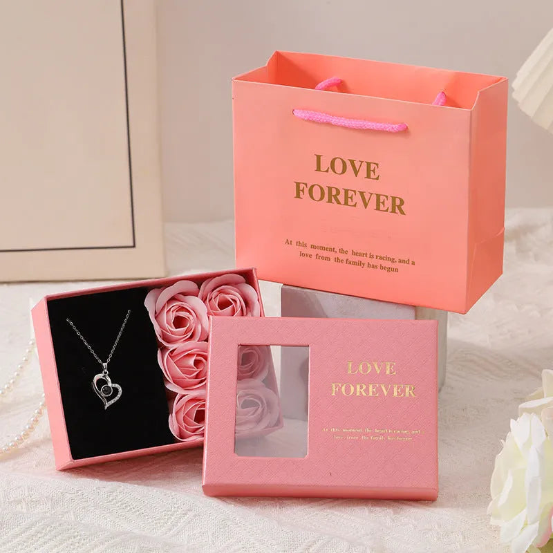 Korean style soap flower gift box set with six roses in red, pink, or black, including a presentation box and handbag.