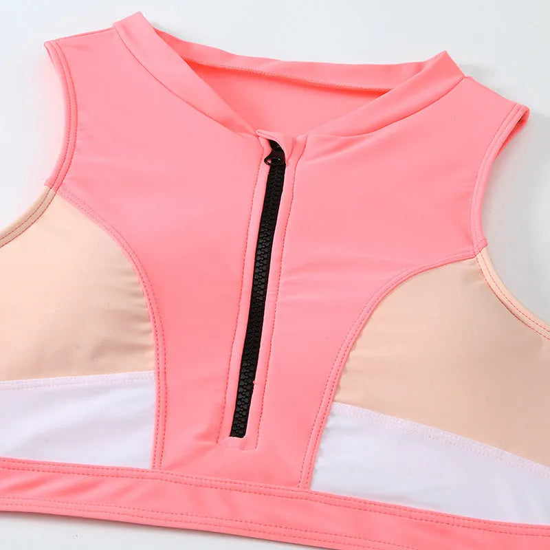 Pink high-waist split bikini swimsuit with brief styling and elastic nylon construction