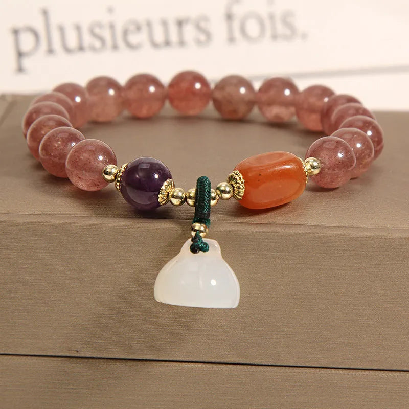 Women's multi-layer crystal bracelet with Korean design featuring natural garnet and assorted gemstone pendants