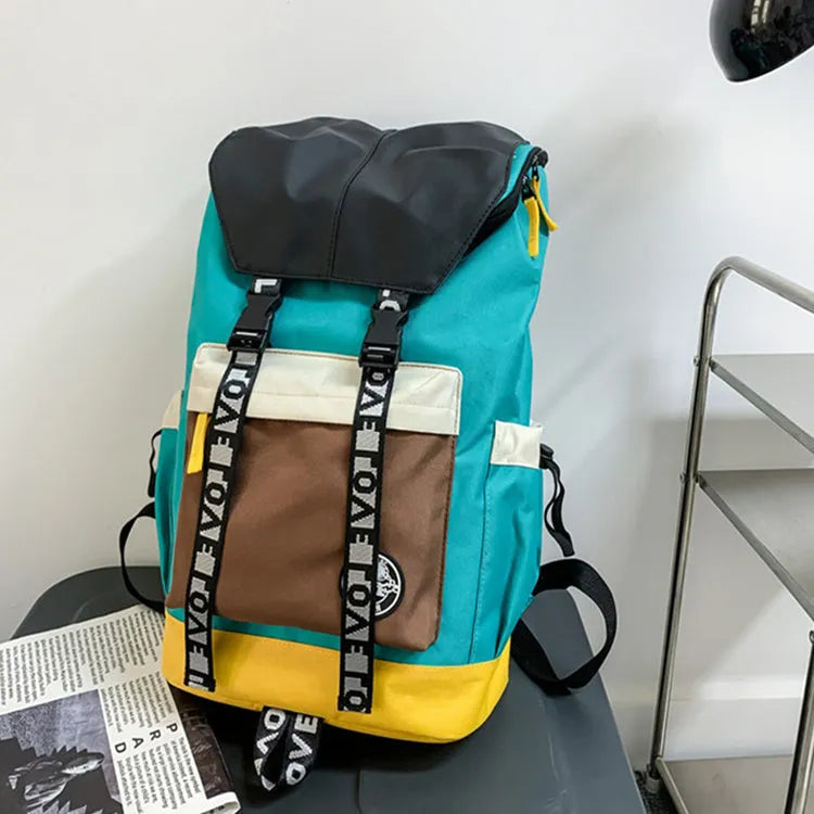 Oxford cloth backpack shown in black, green or red with handheld and shoulder straps.