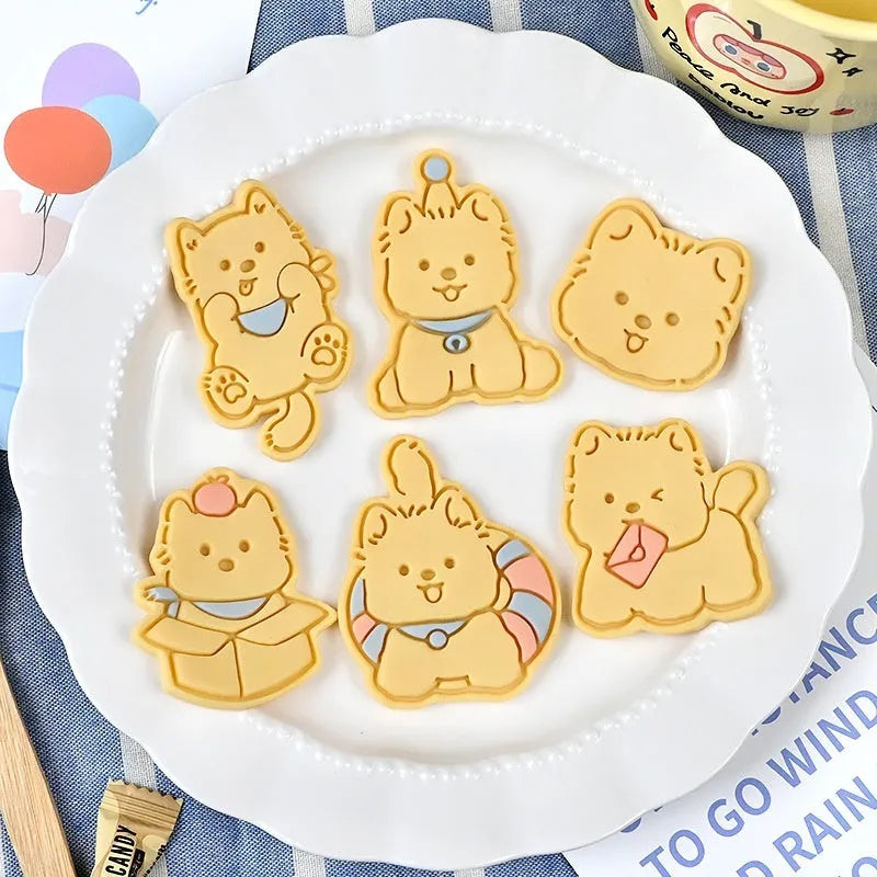 Three-dimensional plastic biscuit mould with dog-themed cartoon designs