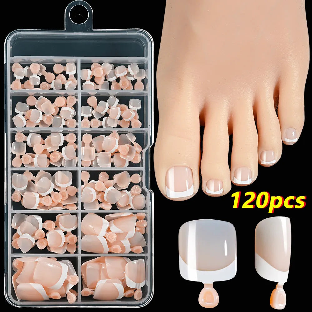 120 piece box of French white edge nude artificial toenails in nine shades, square short shape for toes.