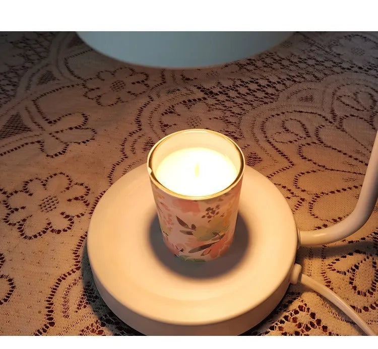 White European-style metal aromatherapy lamp with dimmer switch on wooden table